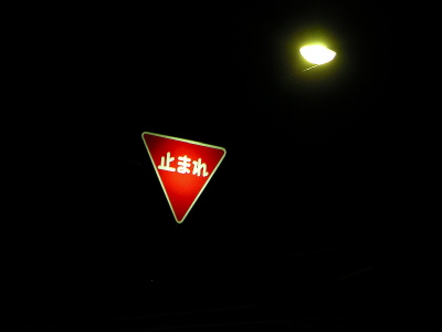 Î~