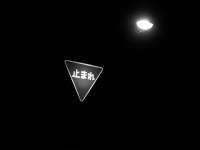 Î~